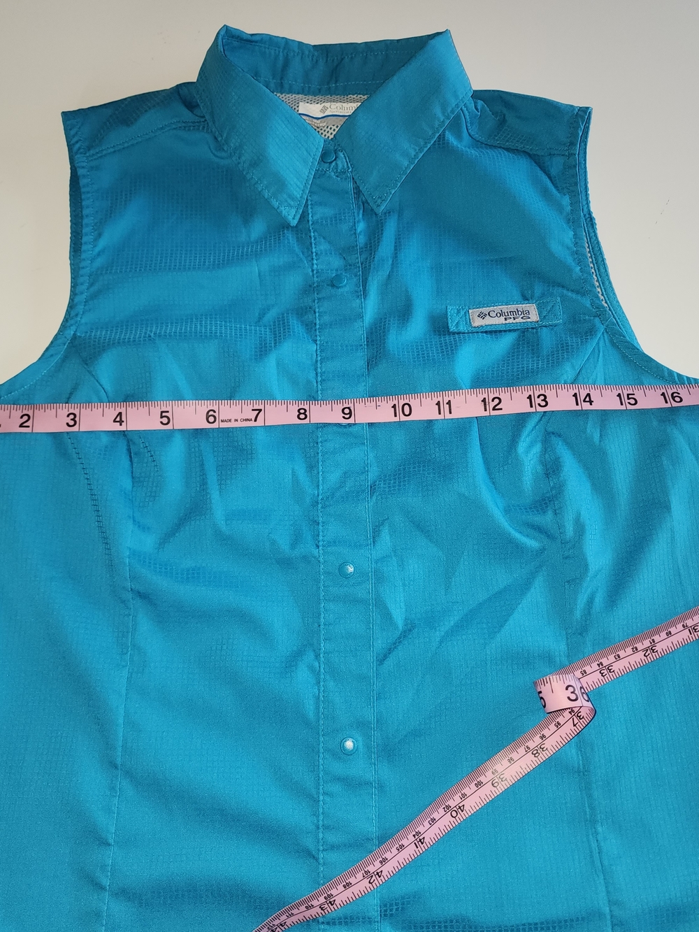 Columbia Sleeveless Button-Down Shirt in Bright Turquoise - Picture 9 of 11